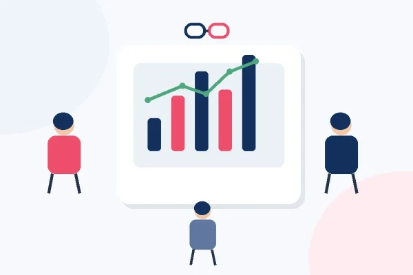 Professionisti analizzano una strategia di link building aziendale su laptop